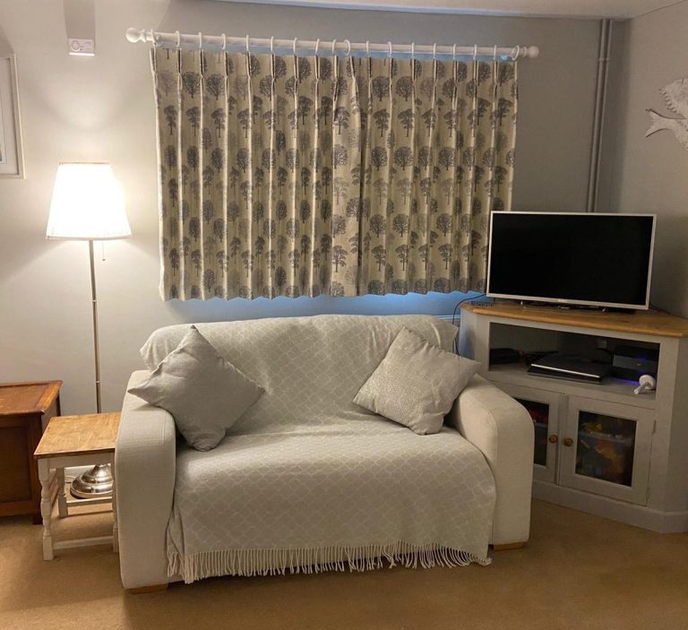 Double pleat sill length curtains